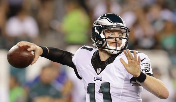 Eagles' Carson Wentz throws his first pass late in the second-quarter against the Tampa Bay Buccaneers in a preseason game on Thursday, August 11, 2016 in Philadelphia.  YONG KIM / Staff Photographer
